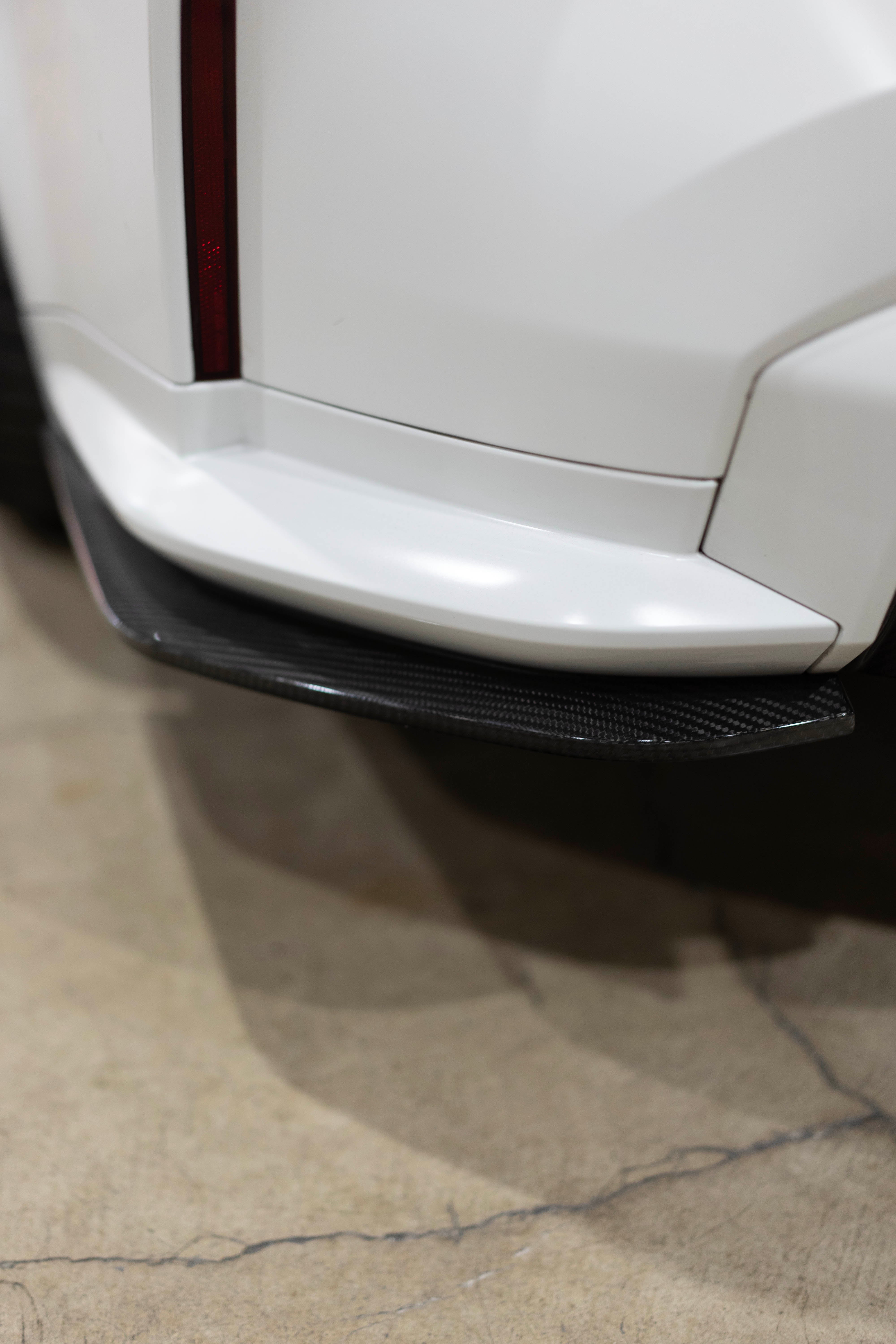 BMW G8X M3 and M4 Carbon Fiber Rear Bumper Skirt Extensions