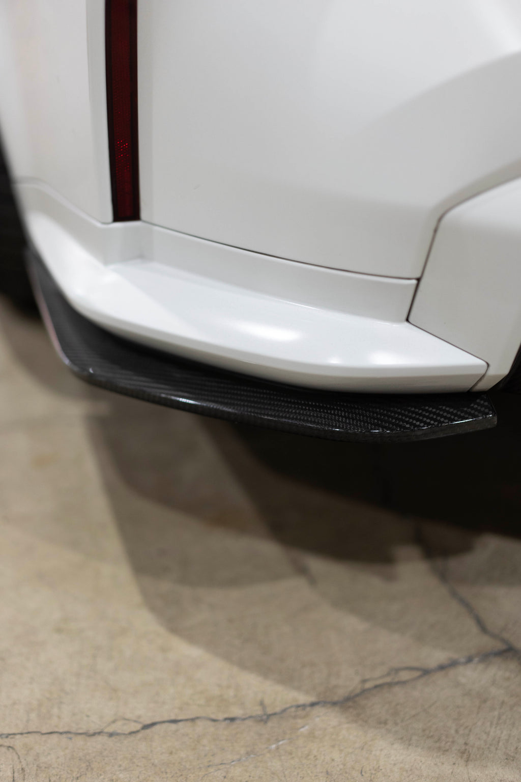 BMW G8X M3 and M4 Carbon Fiber Rear Bumper Skirt Extensions